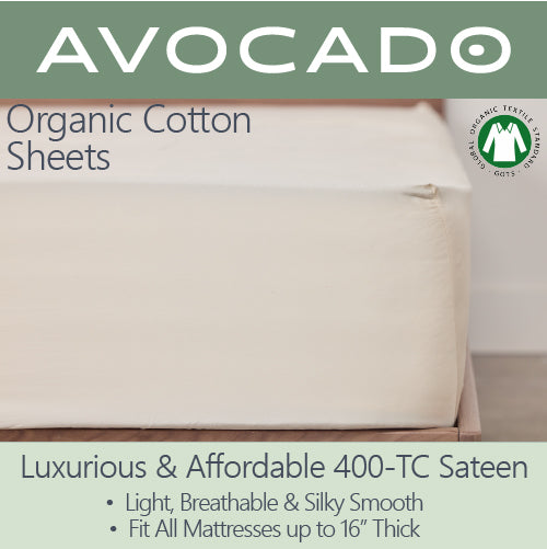 Picture of Avocado Organic Cotton Fitted Sheet on a mattress in the cream color. It is luxurious and affordable 400-TC sateen. Light, breathable, and silky smooth Fit all mattresses up to 16" thick.