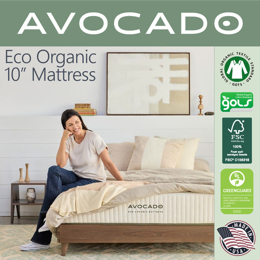 Picture of a woman sitting on the edge of an Avocado Eco Organic 10" Mattress.