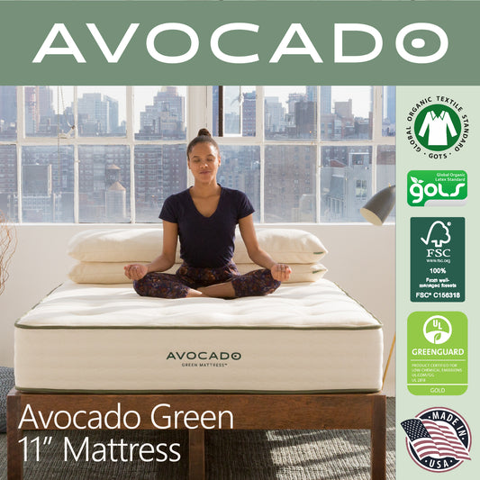 A picture of a woman meditating on top of an Avocado Green 11" Mattress.