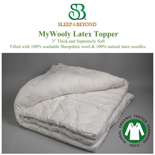 Picture of a folded Sleep&Beyond myWooly Latex Topper that is 3" thick and supremely soft. Filled with 100% washable Shropshire wool and 100% natural latex noodles. It has the GOTS seal of approval.