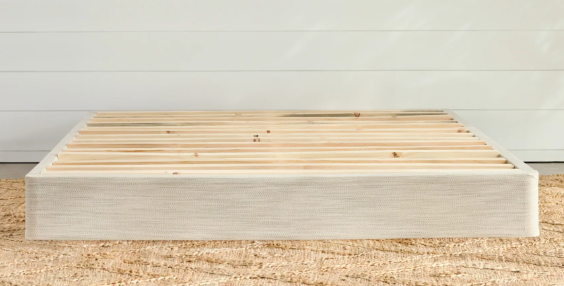 A picture of the Avocado Foundation resting on the bedroom floor. The foundation has numerous slats running the entire width of the foundation to provide ample support for your mattress. 