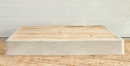 A picture of the Avocado Foundation resting on the bedroom floor. The foundation has numerous slats running the entire width of the foundation to provide ample support for your mattress. 